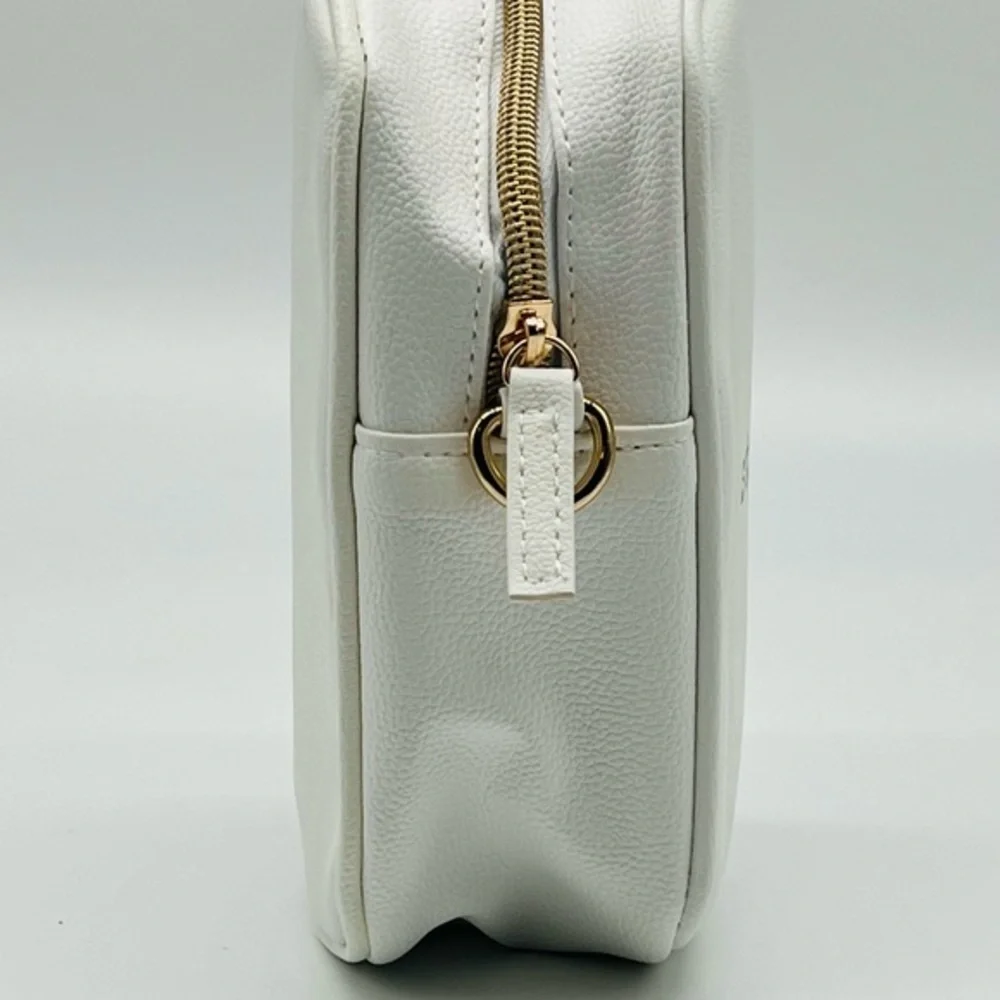 STILA white cosmetic crossbody bag